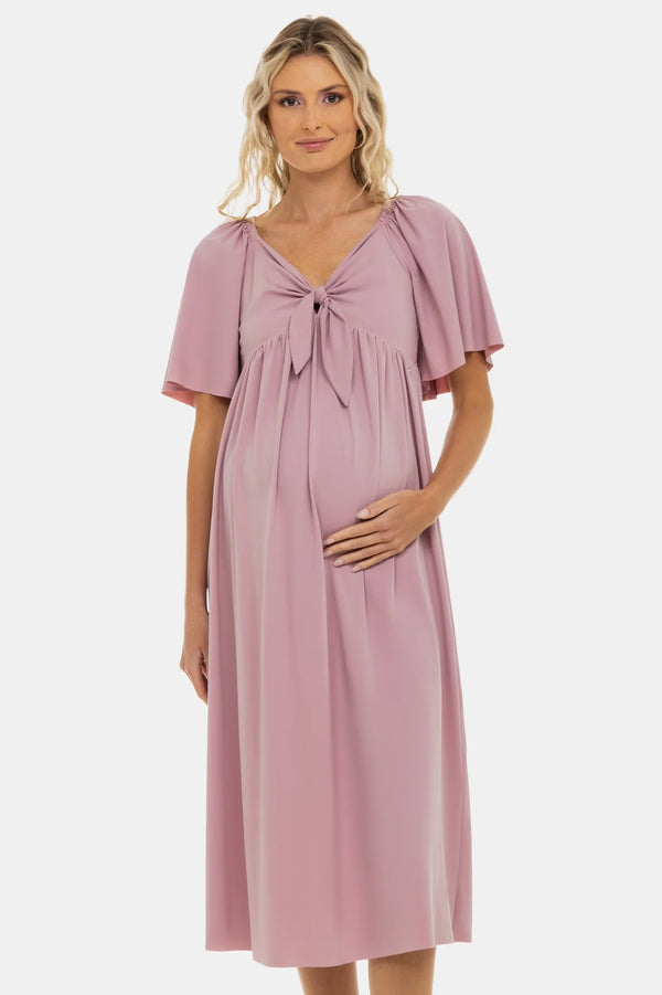 Těhotenské šaty s řasením a mašlí – pudrové
