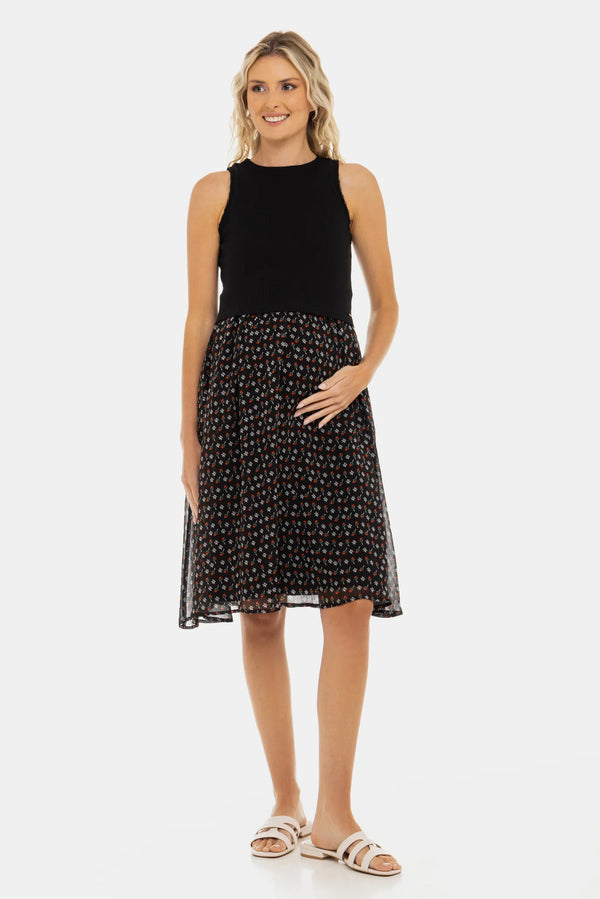 Elegantní šaty s černým bavlněným žebrovaným topem a vzdušnou květovanou sukní