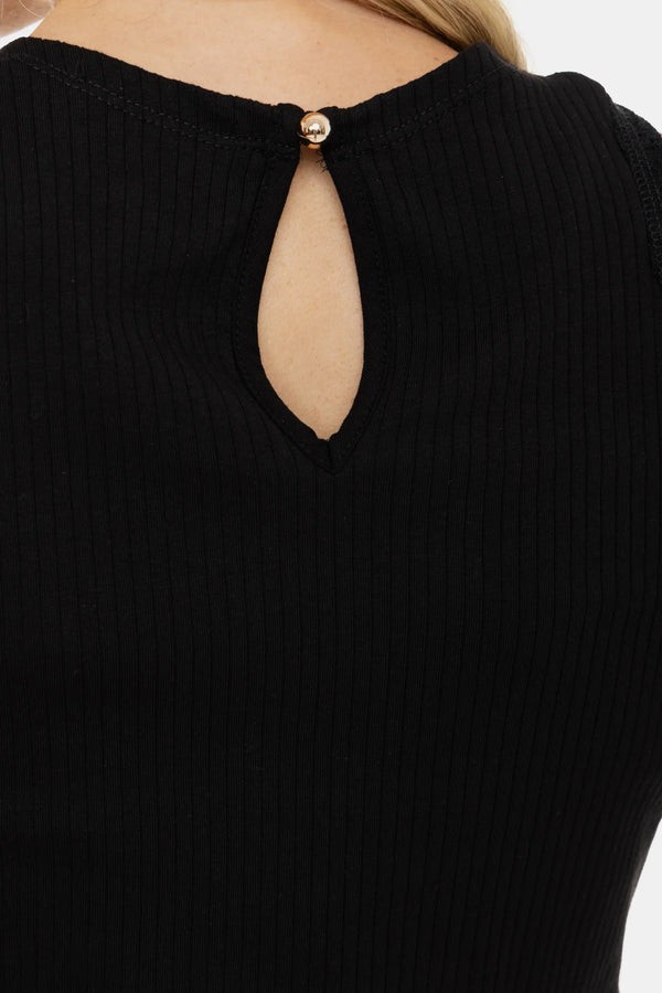 Elegantní šaty s černým bavlněným žebrovaným topem a vzdušnou květovanou sukní